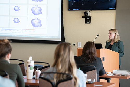 Photo of Andrea Gordon presenting.